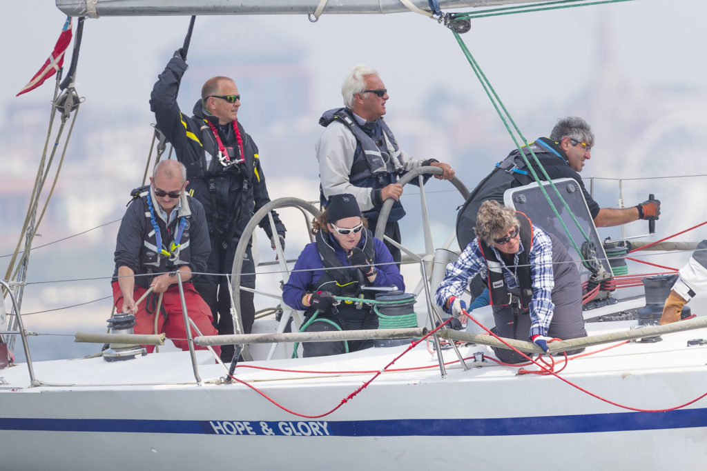 Close up of the crew onboard Hope & Glory racing in the VPRS National Championships at the 2018 International Paint Poole Regatta. Photo courtesy of Ian Roman Photography